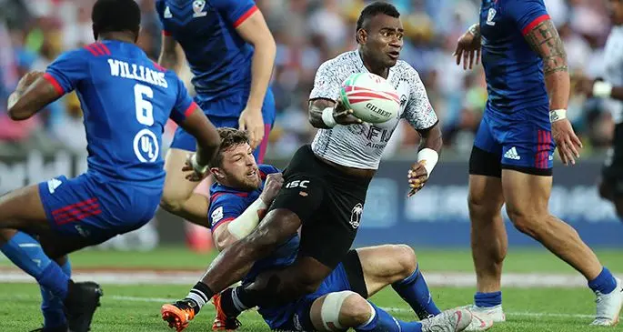 Fiji Airways Fijian 7s halfback Seremaia ‘Jerry’ Tuwai is tackled by fellow nominee Stephen Tomasin of the USA during the Hamilton 7s Cup final. Photo: World Rugby