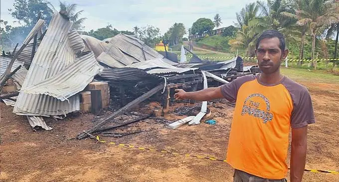 Home owner Rajendra Prasad in front of his house that was destroyed by the fire on January 8, 2024. Photo: Sampras Anand