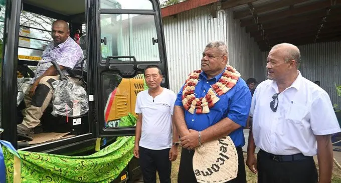 Minister for Agriculture and Waterways Vatimi Rayalu (in garland), with the Permanent Secretary for Agriculture Dr Andrew Tukana (far right) and Tian Ruige (second from left) during the official handing over ceremony. Photo: Ministry of Agriculture and Waterways
