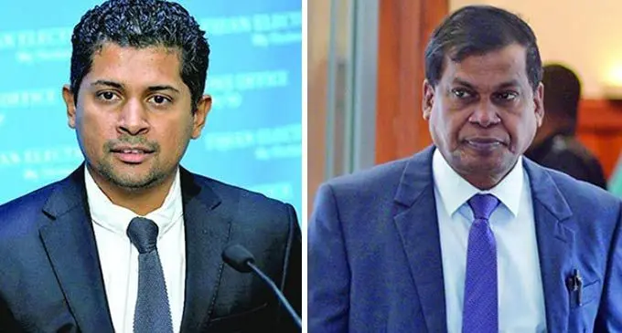 From Right: Supervisor of Election Mohammed Saneem and National Federation Party (NFP) leader, Biman Prasad.