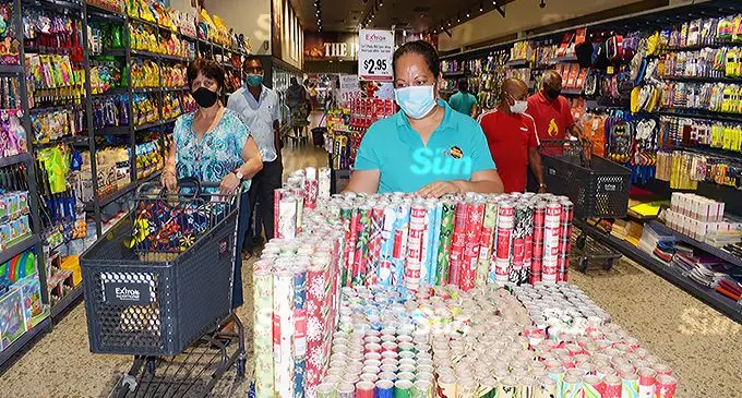Shoppers and staff members of Extra Laucala Beach at Challenge Plaza in Laucala Beach during the opening on December 2, 2021. Photo:  Ronald Kumar