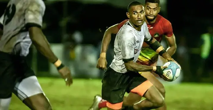 Fiji Development playmaker Inia Tawalo on attack against Kombat Uluinakau in the Cup final of the Fiji Bitter Nawaka Sevens at Prince Charles Park, Nadi, on February 4, 2023. Photo: Pita Simpson