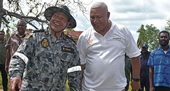 Padre Simote Finau of the Australian Defence Force with the Prime Minister Voreqe Bainimarama on Galoa Island on January 15,2021.  Photo: Laisa Lui