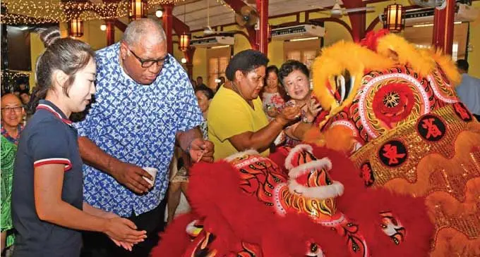 President of Fiji, Wiliame Katonivere “dot the eyes of the Lion” during the celebration of the China National Day and Mid-Autumn Festival 2024 held in Suva. Photo: Fiji Government