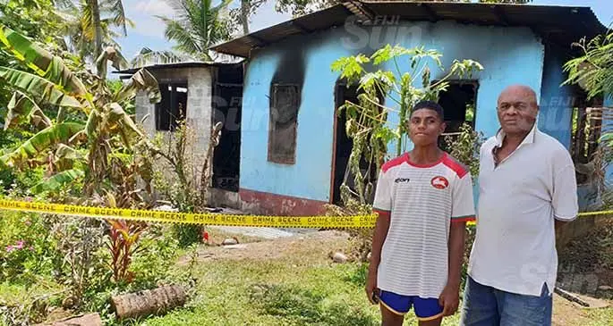 Maikali Turuva (left), with uncle, Maloni Ralumu in front of his home in Sabeto Village in Nadi on January 19, 2021. Photo: Nicolette Chambers