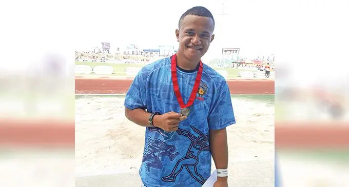 The late Daniel Savea, 15, of Rotuma High School, with his silver medal he won in the junior boys shot put event during the Coca-Cola Games on August 18, 2022, at the HFC Bank Stadium in Suva. Photo: Sereana Salalo