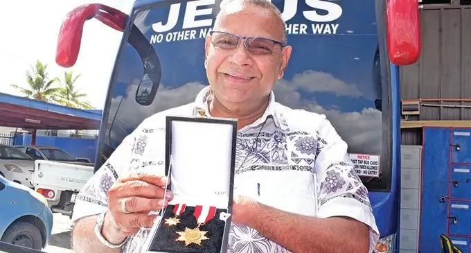 Former Lami Town Council special administrator and director of Shore Buses Limited with his Officer of the Order of Fiji medal on December 2, 2020. Photo: Ronald Kumar