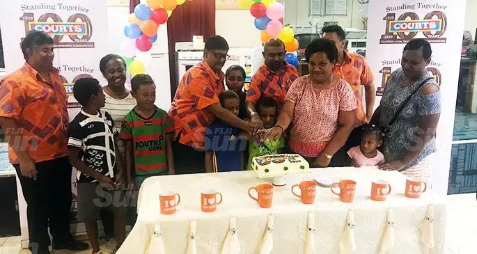 Courts Fiji staff celebrate the company’s 100th birthday with customers at Rodwell Roadon June 26, 2020. Photo: Karalaini Waqanidrola