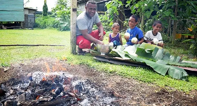 Laisiasa Bogidua (left) of Lovoni Village.Ono-i-lau with his children, Emanueli Api,Semisi Tuisogo and Joji Vakatawa    prepare a lovo for their family Christmas lunch at Tovata in Nasinu ion December 25, 2019. Photo: Ronald Kumar.