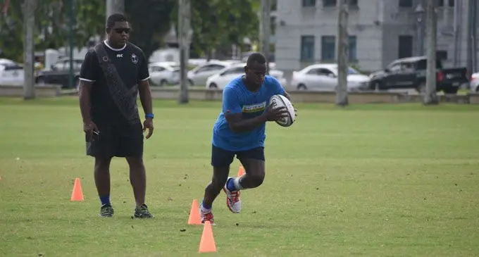 Fiji Airways Fijian 7s assistant coach Saiasi Fuli (left) works with Sakeo Railoa at Albert Park, Suva, on February 12, 2018.  Photo: Peni Komaisavai