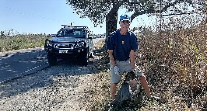 Adrian Sofield was spotted picking rubbish on the roadside of Denarau Road in Nadi and then loading it onto his vehicle for proper disposal later. Photo: Mereleki Nai