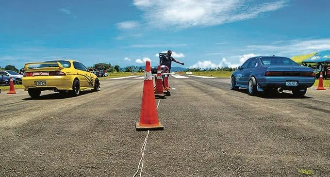 The race marshall summons two vehicles at the start.