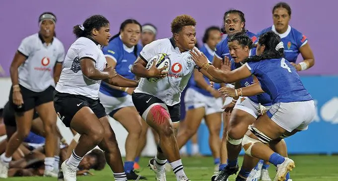 Vodafone Fijiana XV prop Vika Matarugu (with ball) leads the charge with hooker Loraini Senivutu in support in Dubai. Photo: FRU Media
