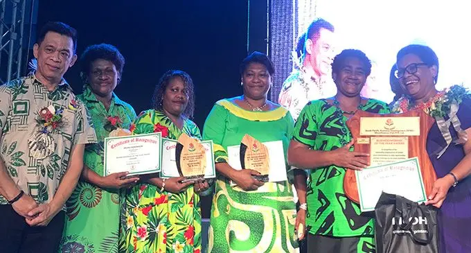 South Pacific Business Development Fiji general manager and director Elrico Munoz (left) with the Businesswoman of the Year nominees, winner Seruwaia Wati, and the Pacific Community (SPC), Pacific Women Principal Strategic Lead Mereseini Rakuita during the SPBD awards night at the Vodafone Arena on October 20,2022. Photo: Sosiveta Korobiau.