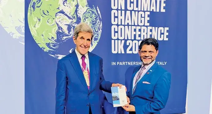 A-G meets Kerry: Attorney-General and Minister for Climate Change Aiyaz Sayed-Khaiyum had the opportunity to present a copy of Fiji’s Climate Change Act to the first United States Special Presidential Envoy for Climate, John Kerry.  Photo: Office of the Attorney-General