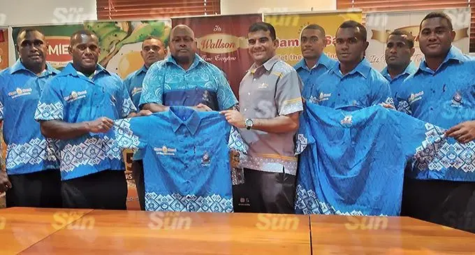 Ram Sami Business Development Manager Abdul Shameer presents the Police Bula shirts to the Police Rugby Development side manager, Orisi Kunakata, in Valelevu on December 16, 2021. Photo: Simione Haravanua