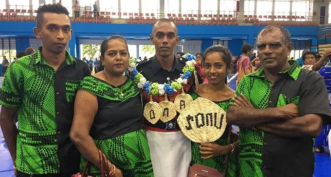 New Fiji Police Force recruit, Sonal Prasad (centre) with his family during the passing out parade on January 17, 2020.  Photo: Renu Radhika