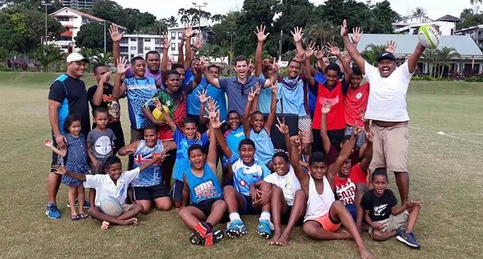 Holy Trinity Anglican Primary School under-13 and 14 players with Fiji Airways Fijian 7s coach Gareth Baber at Albert Park, Suva on June 18, 2019. Photo: Supplied by Luke Ramasima