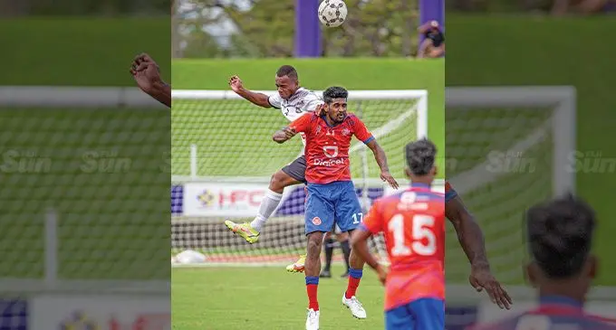 Suva’s Simone Nabenu attacks against Navua’s Netani Doli during their Digicel Premier League match at the HFC Bank Stadium on August 14, 2022. Photo: Leon Lord.