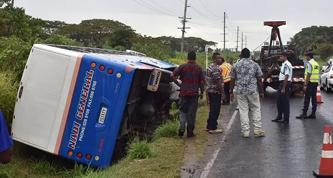 The bus on its side at the Nadi back road on August 30, 2019.  Photo: Waisea Nasokia