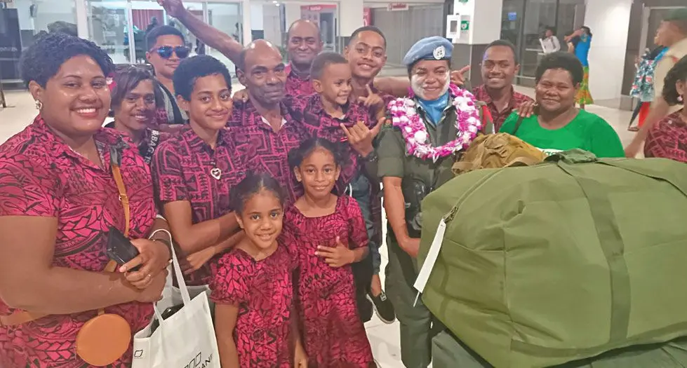 Private Mereula Kunaulu (with garland), surrounded by family members at the Nadi International Airport on January 27, 2025. Photo: Waisea Nasokia
