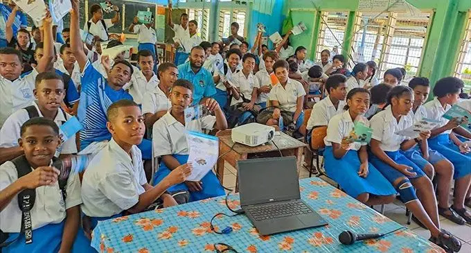 Students of Immaculate Conception College in Bua learn more about the 4FJ Fish Smart through a presentation by Bua conservation officer, Manasa Vula. Photo: Ministry of Fisheries and Forestry