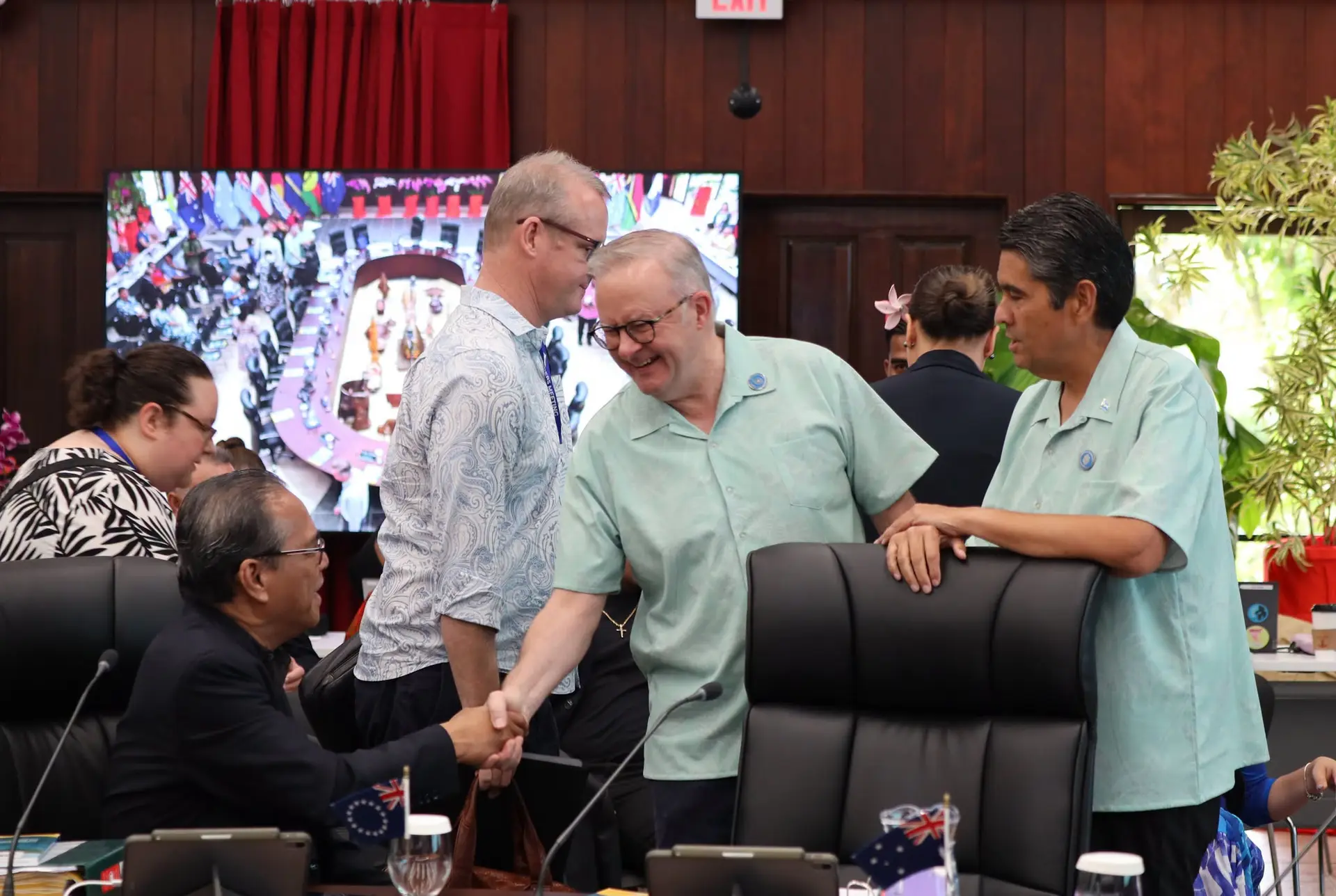 Australian Prime Minister Anthony Albanese shares a light moment with President of the Federated States of Micronesia Wesley Simina at the Pacific Islands Forum meeting Koro, Palau.