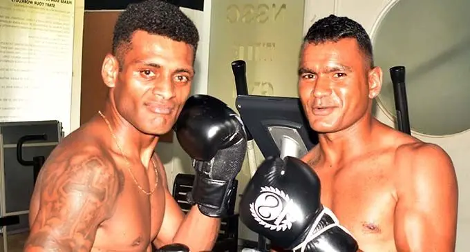 Ready to rumble: From left Fijian super welterweight champion Jese Ravudi shapes up with Ronald Naidu during a press conference at the  Nadi Sports and Social Club on November 21, 2019. Photo: Waisea Nasokia