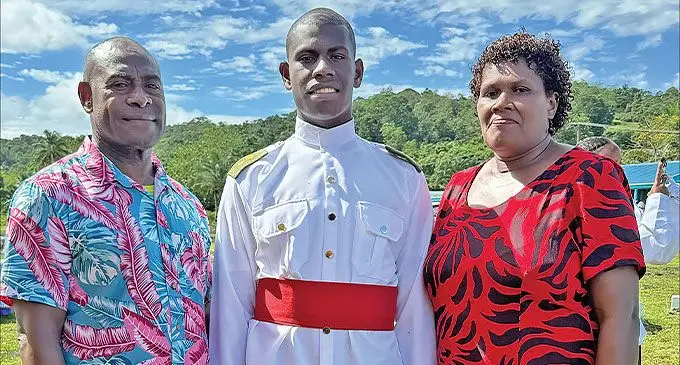 Father Anaia Waqalevu, Baton of Honour recipient Tevita Tuiloma, and mother Merelita Waqalevu. Photo: Kelera Tuisawau