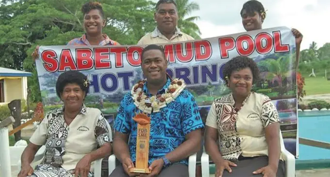 Sabeto Mud Pool and Hot Springs and Therapeutic Spa employee, Sevuloni Nasilasila (standing up, middle) with other employees during the company’s awards night on March 15, 2019. Photo: Milly Campbell