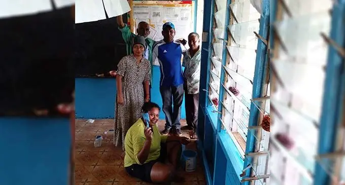 Nakasi Youth Club Labasa branch president, (second from left) Ashna Priya Lal, with  club member Anjenette Anjette (sitting), area advisory councillor, Mohammed Janif and  Korokadi Primary School management during the school painting work in Bua on July 30, 2022. Photo: Nakasi Youth Club