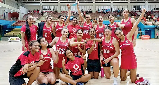 Tonga Talas after their win against the Fiji Pearls at the Vodafone Arena, Suva, on July 20, 2022. Kneeling second from left is goal shooter, Uneeq Palavi. Photo: Ronald Kumar