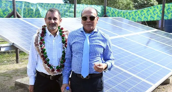 Sunergise Director, Ajay Raniga and Energy Fiji Limited Director, Hasmukh Patel by the solar grid on Vio Island. Photo: DEPTFO News