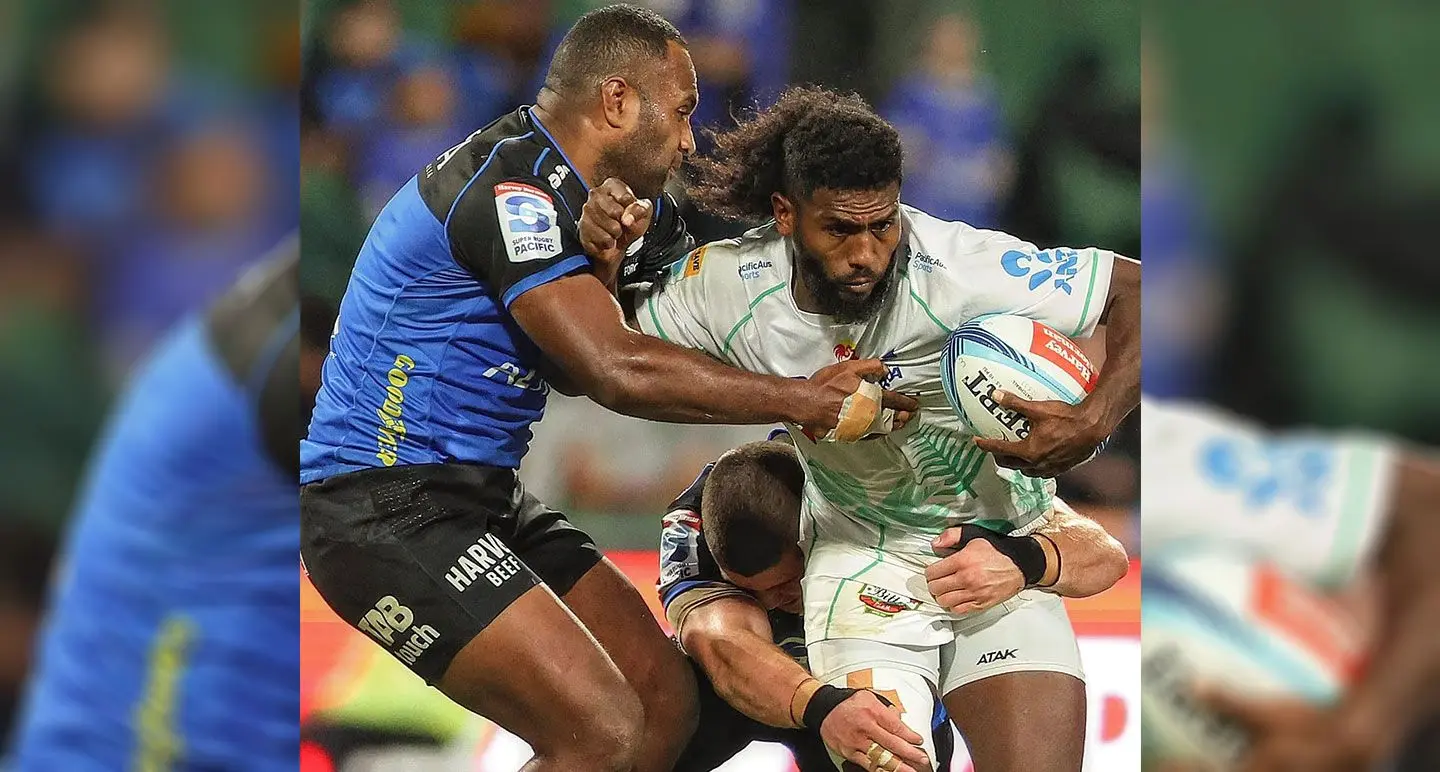 Swire Shipping Fijian Drua halfback Frank Lomani (with ball) is being tackled by Manasa Mataele of Western Force at HBF Park on Perth, Australia, on May 12, 2023. Photo: Fijian Drua  