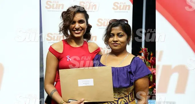 From left: Fiji Sun Digital Journalist Jennis Naidu with mum Rohini Naidu after she won The Fiji Times Award for Best News Reporting on October 18, 2019. Photo: Kelera Sovasiga