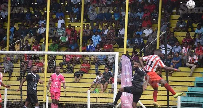 Labasa defender Ilisoni Lolaivalu (11) attempts to head in a cross as Ba goalkeeper Saula Waqanicakau watches on at Subrail Park, Labasa, on March 6, 2021. Photo: Laisa Lui