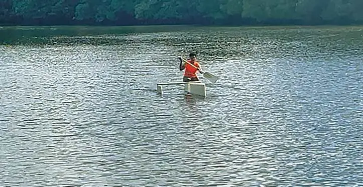 Fishing canoe out on the waters for testing.