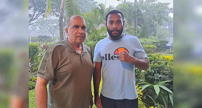 South Pacific Boxing Promotions director Mohammed Shameem (left) with Fiji light heavyweight champion Savenaca Naliva (right)