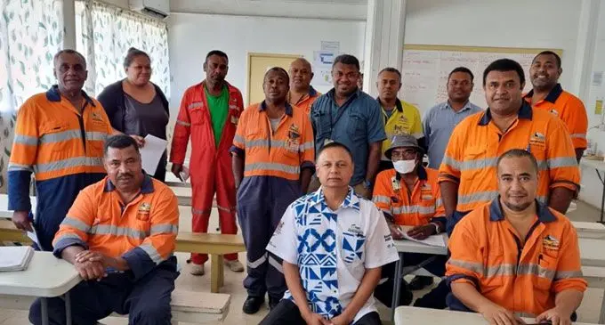 Director of Higher Education Commission, Rohit Kishore (front middle) with Vatukoula Gold Mines Ltd training department staff  members. Photo: Nicolette Chambers