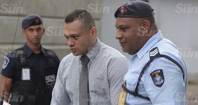 Jone Vakarisi is escorted by Police outside court on May 20, 2020. Photo: Ronald Kumar