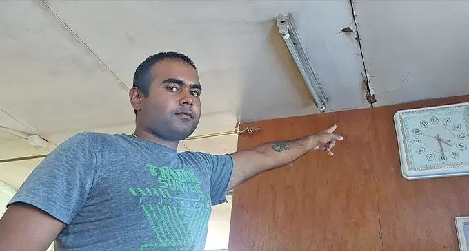 Pritesh Nadan points at a termite infested area of the ceiling at his home at Delai, Tomuka, Lautoka. Photo: Salote Qalubau