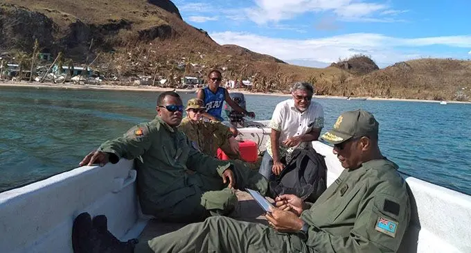 Commander for the Republic of Fiji Military Forces, Rear Admiral Viliame Naupoto (close to the camera), Permanent Secretary for the Ministry of Health and Medical Services James Fong (fourth from left) with the assessment team in the North. Photo: RFMF Media