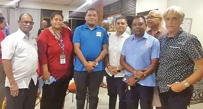 Minister for Local Government Maciu Nalumisa (blue shirt), with members of the Nadi community. Photo: Mereleki Nai