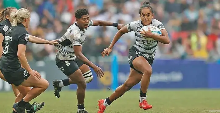 Fiji Airways Fijiana sevens winger Younis Bese (with ball) runs away from New Zealand defenders while Ana Maria Naimasi is in support during the Hong Kong tournament on April 2, 2023. Both players are playing in Toulouse, France, this weekend. Photo: World Rugby