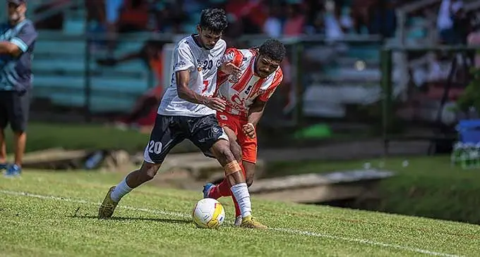 Suva’s Faizal Ali (left) tries to escape from Labasa’s Nemani Dolodai during their Digicel Fiji Premier League match at Ratu Cakobau Park, Nausori on March 3, 2024. Photo: Leon Lord