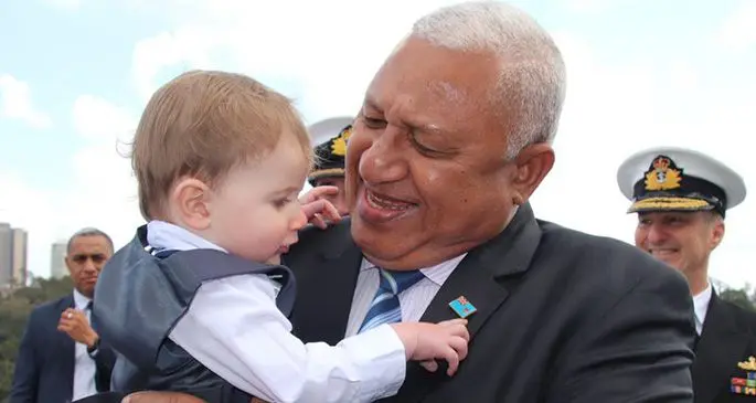 Prime Minister Voreqe Bainimarama with toddler Cooper Brenton onboard the HMAS Adelaide in Sydney, Australia, on September 14 where Cooper had his baptism ceremony. Photo: PM’s Office