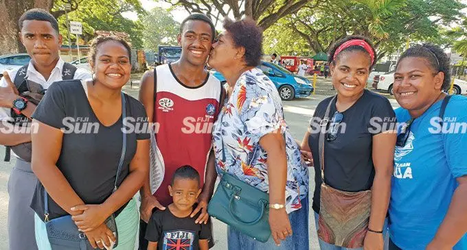 Ba Zone blue ribbon winner, Josateki Valebaca (third from left) is congratulated by his mother Anaseila Adi at Lautoka’s Churchill Park on June 15, 2022. Photo: Nicolette Chambers