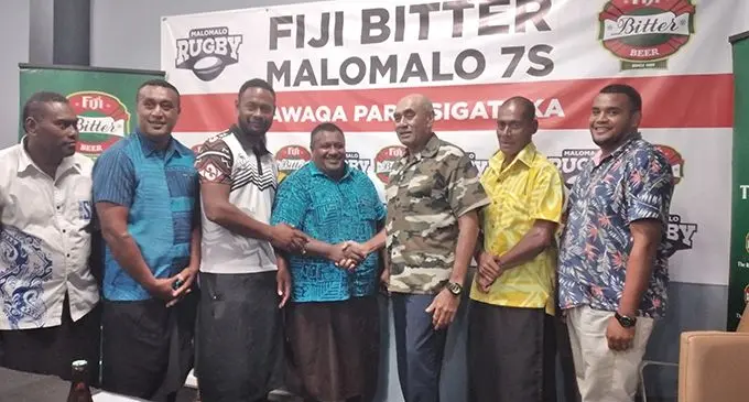 Members of the Malomalo 7s committie with Paradice Beverages Fiji general manager sales and corporate affairs Joe Rodan(fifth from left) after signing their sponsorship deal in Walu Bay, Suva on March 24,2021. Photo: Simione Haravanua