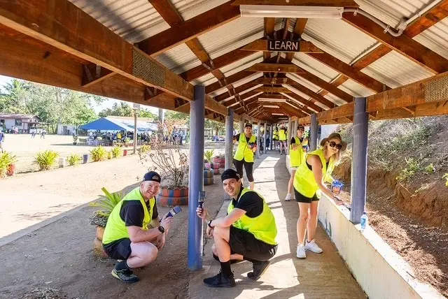 Laser & O’Brien Group staff carry out their project in Nadi District School. Photo: supplied.