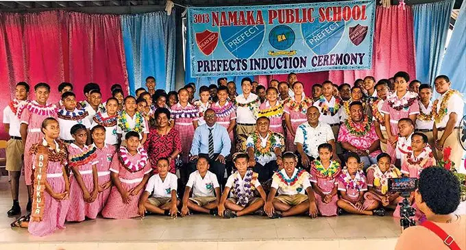 Commissioner Western Mesake Ledua (middle) and Pastor Apenisa Ralullu with school management and school prefects at the Namaka Public School in Nadi.